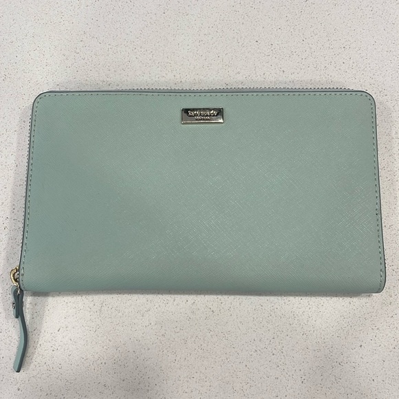 kate spade Handbags - Kate Spade New York Laurel Way Kaden Travel Wallet in Misty Mint